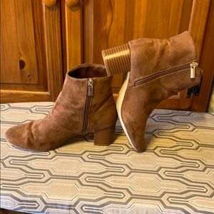 Brown suede booties.